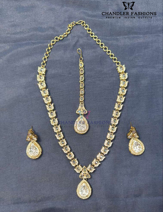 Amazing White Color Stone Embadded Gold Plated Necklace With Earrings And Maang Tikka
