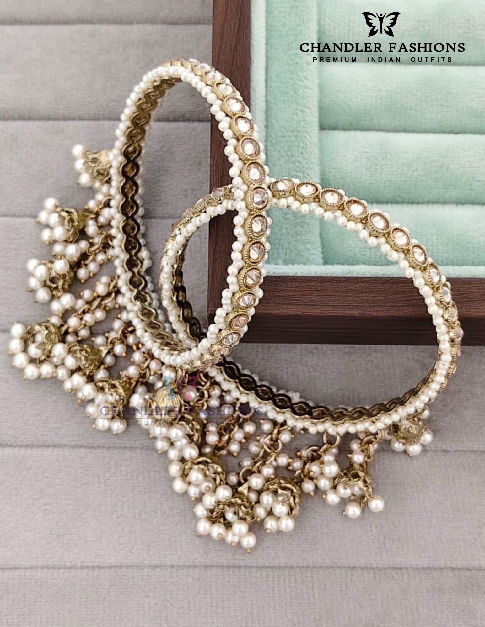 Pretty White Color Stones And Pearls With Jumkha Design American Diamond Bangles For Women