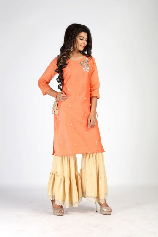 Fascinating Orange Silk Cotton Kurti With Sharara Pants
