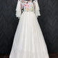 White Georgette Gown With Colorful Sequins Work and Bell Umbrella Sleeves